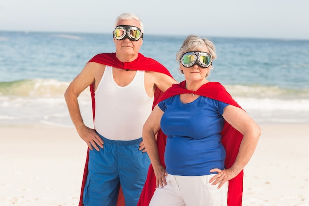 Senior couple wearing superman costume