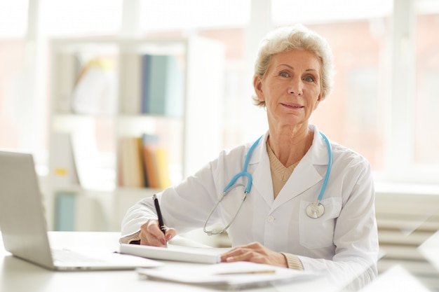 Senior Doctor Posing in Office