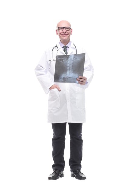 Senior doctor with a stethoscope looking at an x-ray. isolated on a white background.