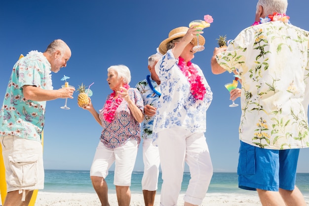 Senior friends drinking cocktails