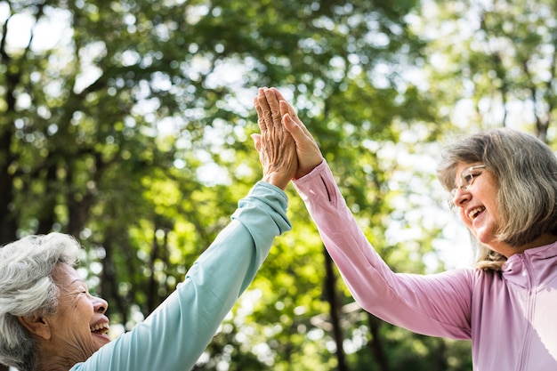 Senior friends exercising outdoors