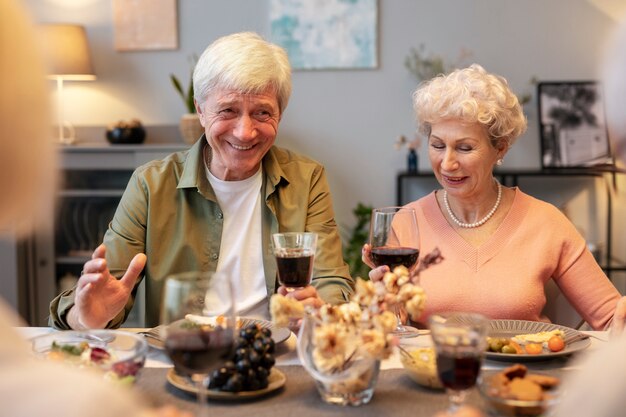 senior friends having a party at night
