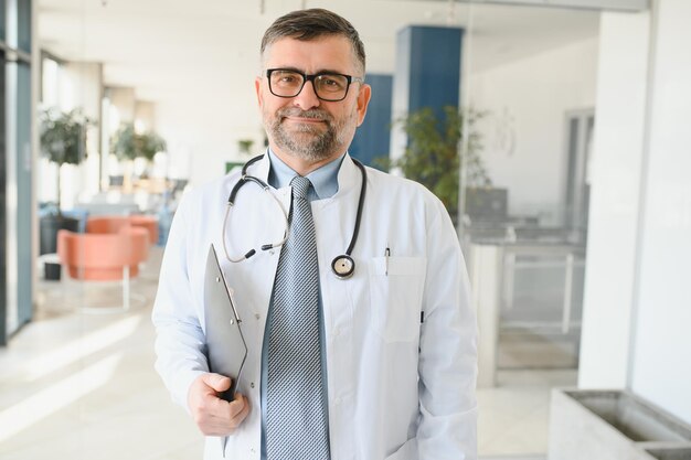 Senior in a hall Doctor in a uniform Man in a glasses