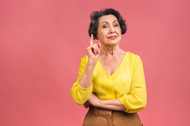 Senior happy aged business woman Beautiful old woman grandmother looking at camera and smiling