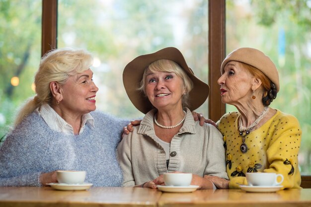 Senior ladies in a cafe