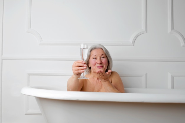 Senior lady having a bath