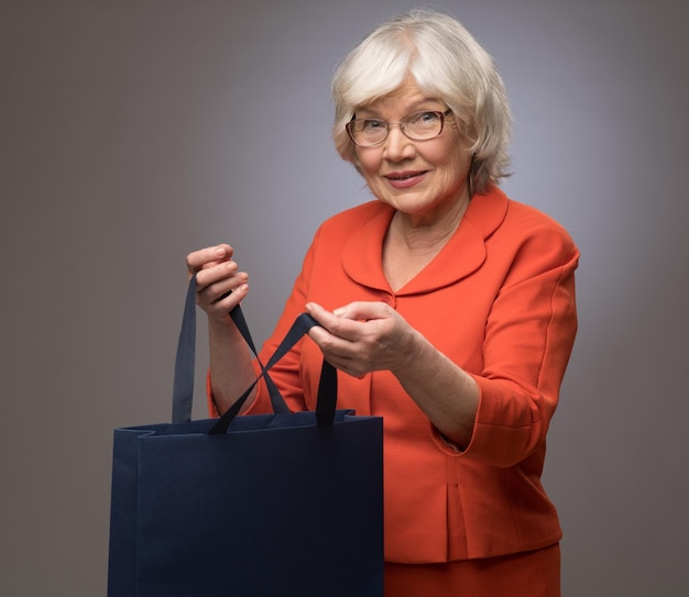 Senior lady with shopping bag