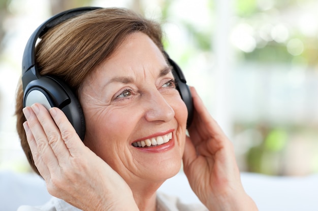 Senior listening to music