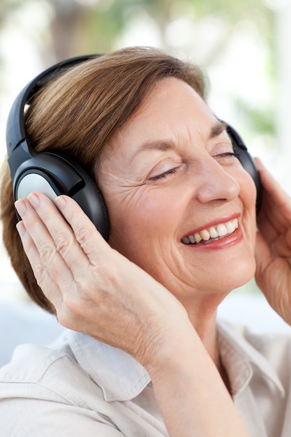 Senior listening to music