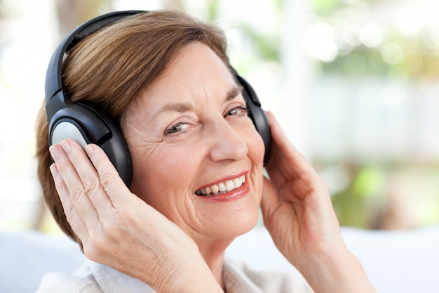 Senior listening to music