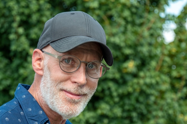 Senior man in a baseball cap portrait