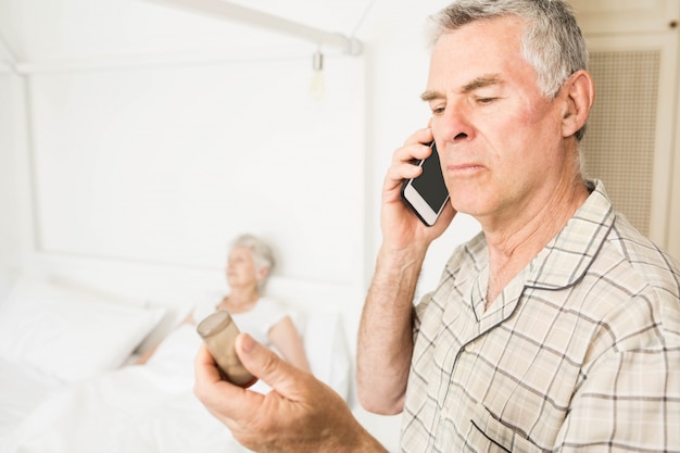 Senior man calling because of pills at home