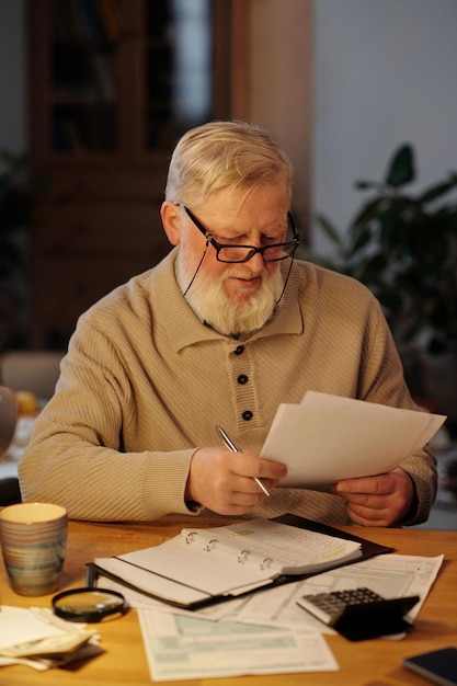 Senior man checking information