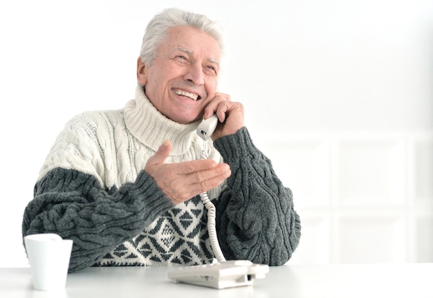 Senior man at office on coffe break