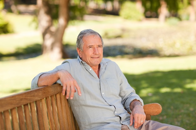 Senior man sitting on a bench