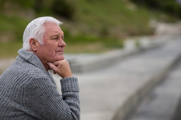 Senior man sitting on the steps