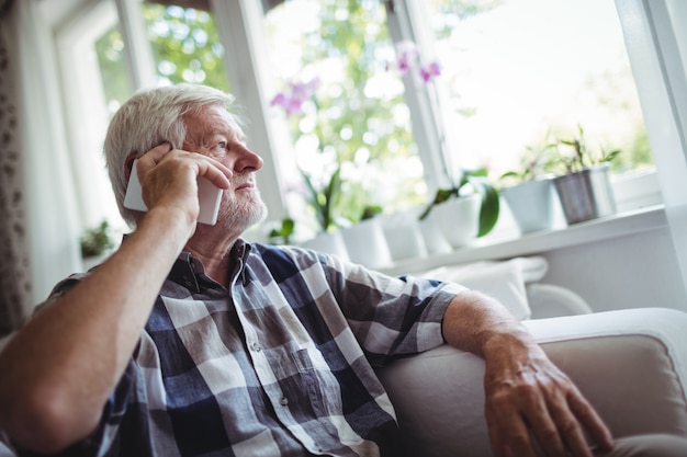 Senior man talking on mobile phone