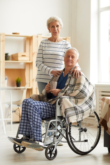 Senior Man in Wheelchair with Wife