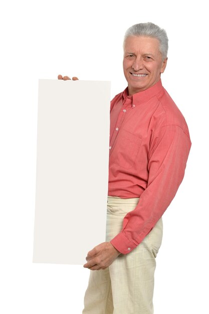 Senior man with blank advertising board or copy space, isolated on white