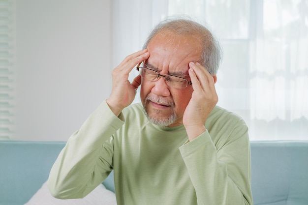 Senior man with headache elderly uncle with dizzy