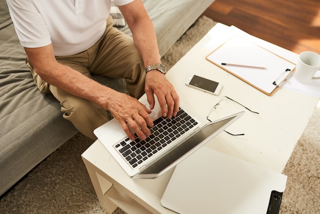 Senior Man Working from Home