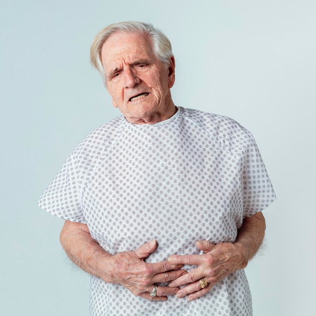 Senior patient having a stomach ache