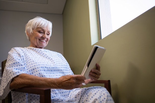 Senior patient holding digital tablet