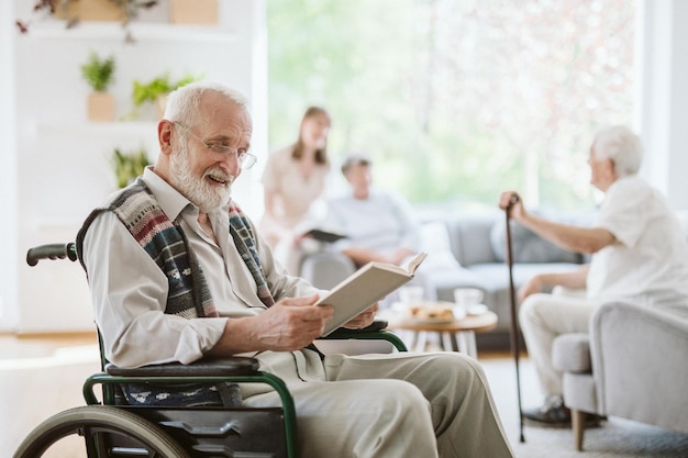 Senior people during afternoon in the nursing home living room