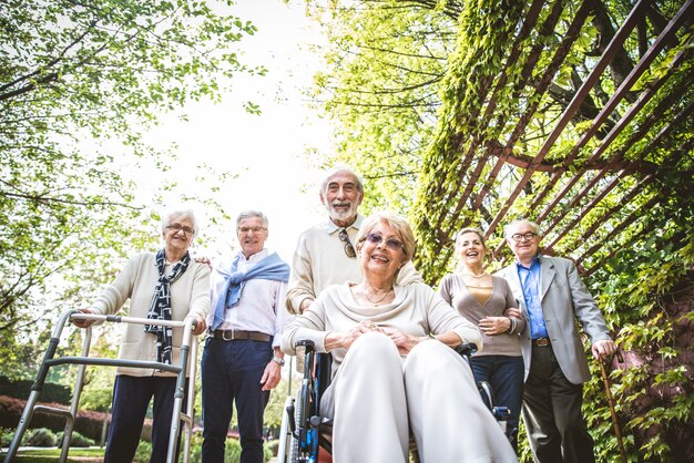 Senior people walking outdoors