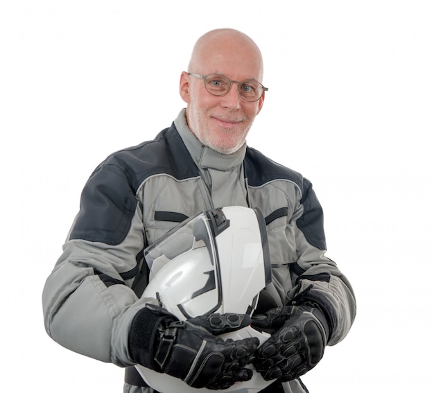 Foto senior ruiter met witte helm