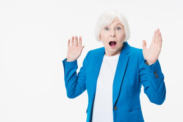 Senior woman afraid with fear expression stop gesture over isolated white background Panic concept