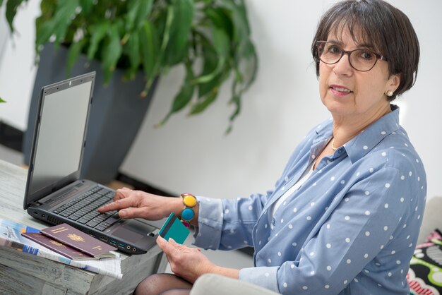 Senior woman doing online shopping