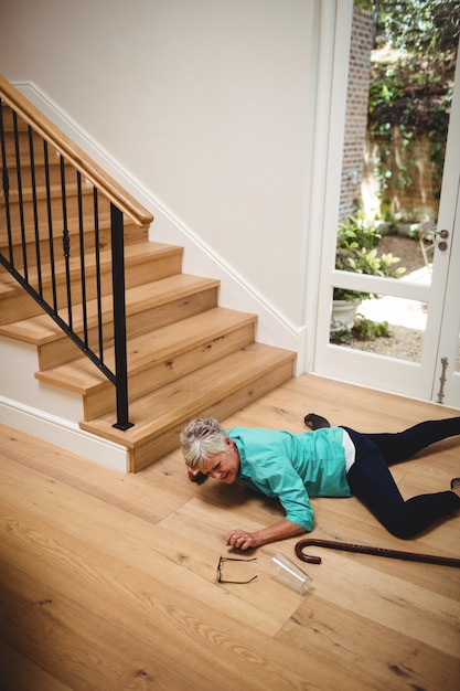 Senior woman fallen down from stairs