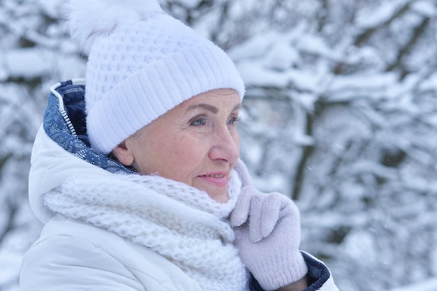 Senior woman in frosty winter