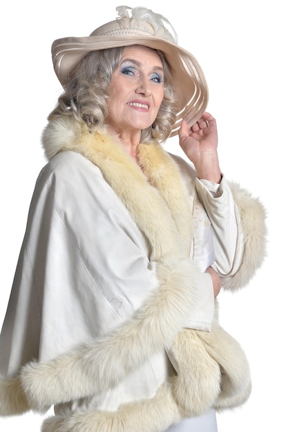 Senior woman in hat posing