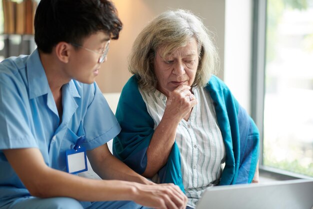 Senior woman learning sending emails