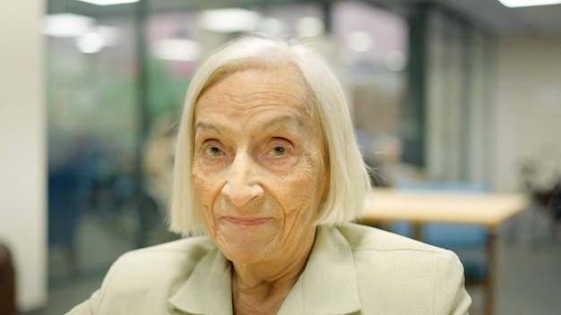 Senior woman looking to the camera and smiling