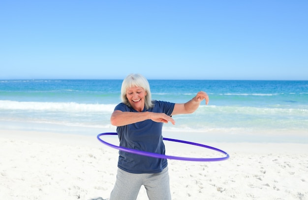 Senior woman playing with her hoop