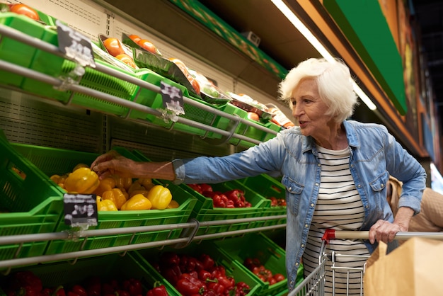 Senior woman shopping in supermarket
