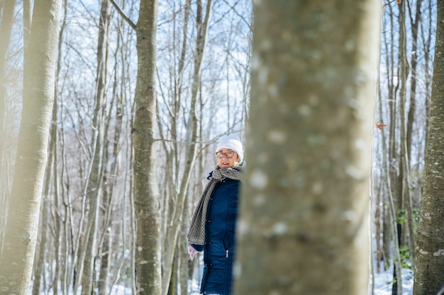 Senior woman in the snow