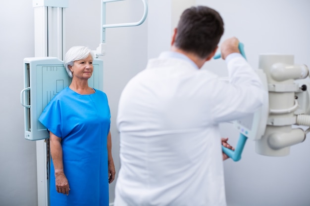 Senior woman undergoing an x-ray test