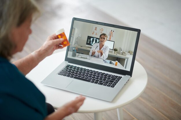 Senior Woman Video Calling Doctor