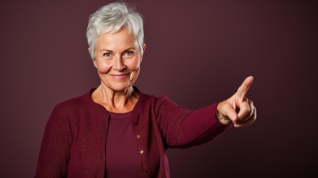 Senior woman wearing casual clothes pointing with hand and finger to the side looking at the camera