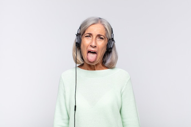 senior woman with headphones