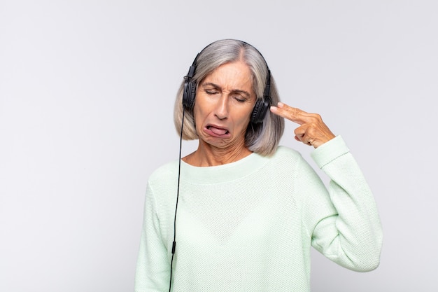 senior woman with headphones