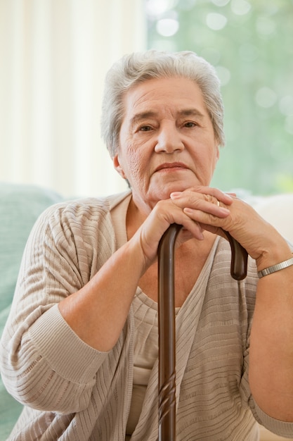 Senior woman with her walking stick