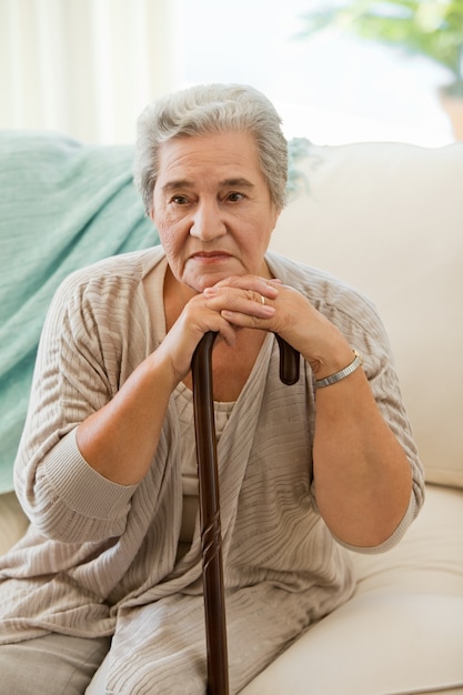 Senior woman with her walking stick