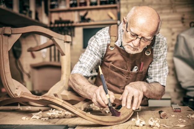 Senior woodworker on duty