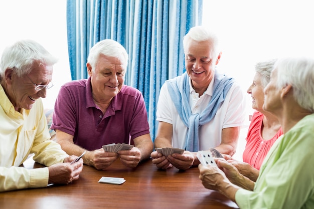 Seniors playing cards together