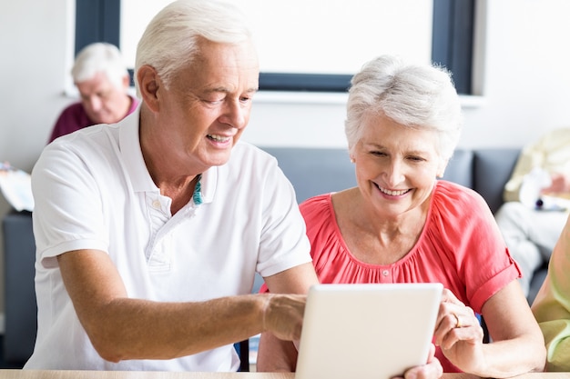 Seniors using a tablet